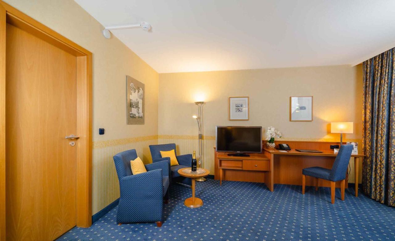 Plaza Inn Koeln Пульхайм Экстерьер фото
