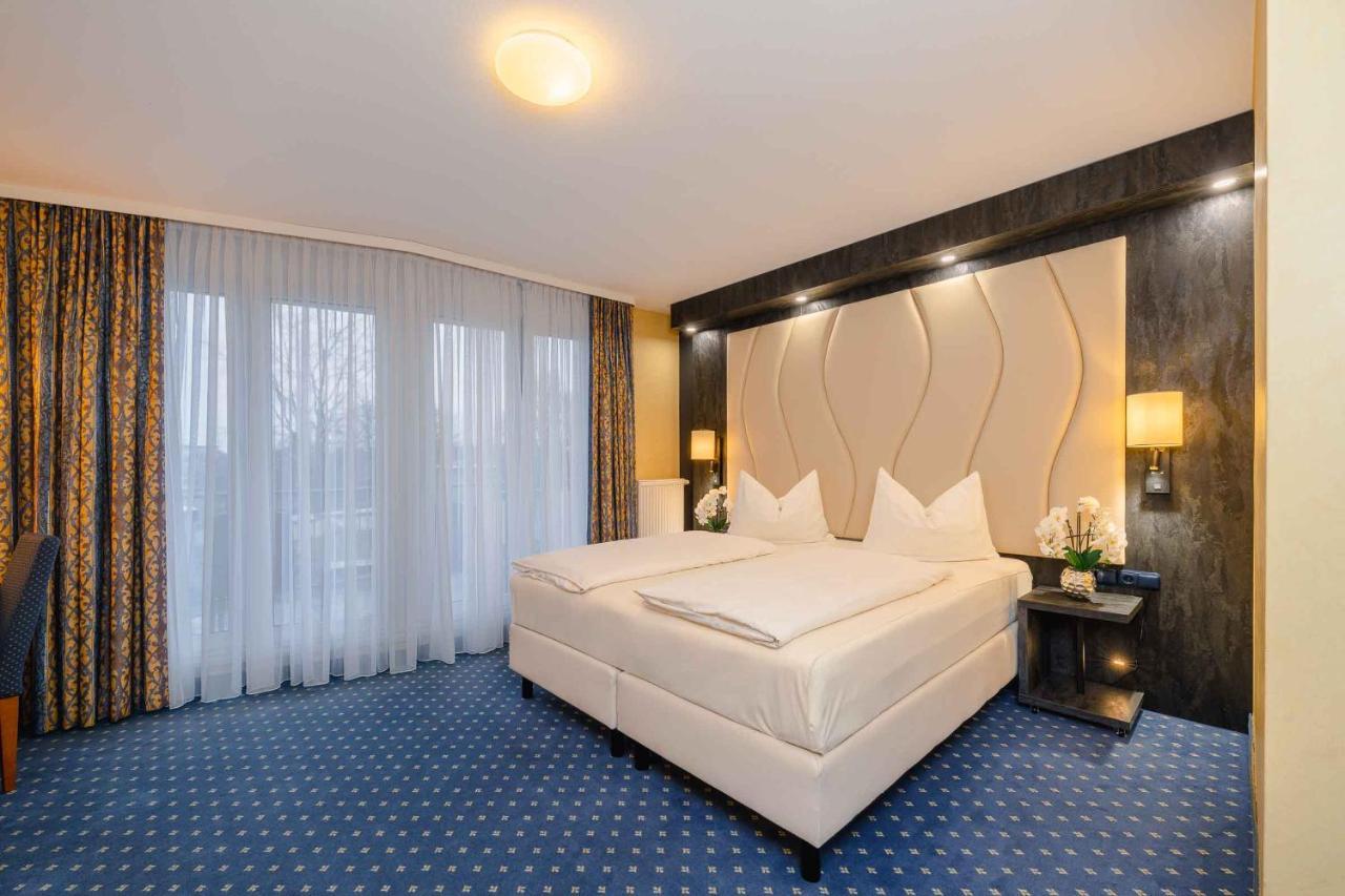 Plaza Inn Koeln Пульхайм Экстерьер фото